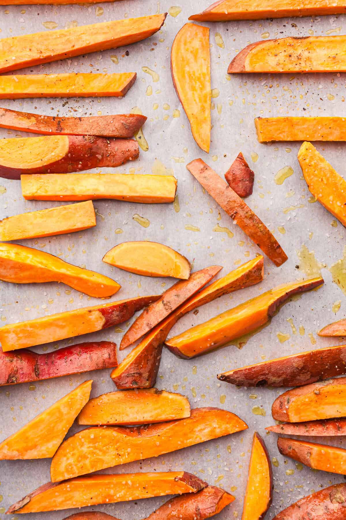 sweet potatoes cut in to strips coated with olive oil  and sprinked with salt and pepper 