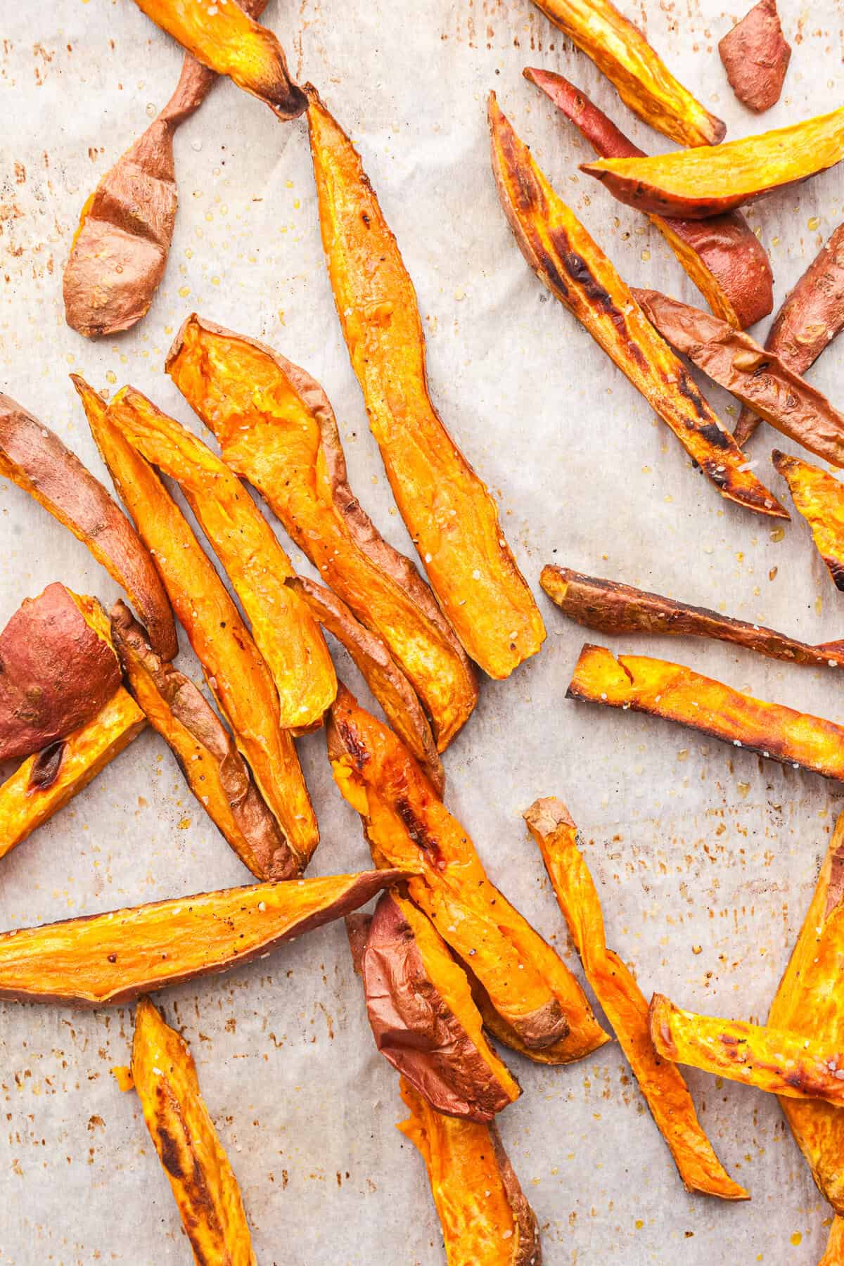 roasted sweet potatoes on a parchment line pan 